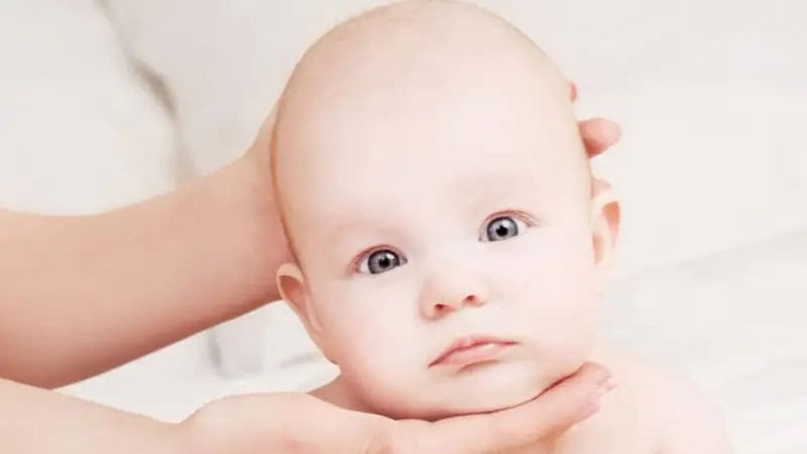 bantal untuk bayi tortikolis